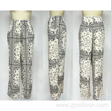 PRINTED TROUSERS WITH AN ELASTICATED WAISTBAND